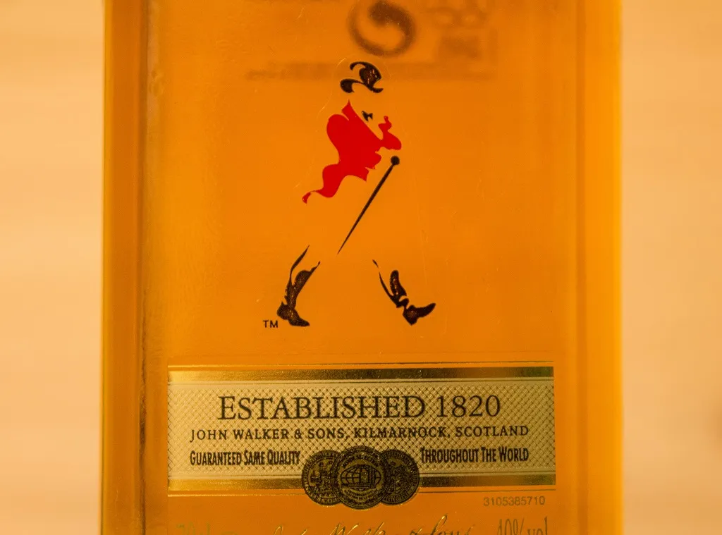 Hier das Logo auf dem Johnnie Walker Red Label.